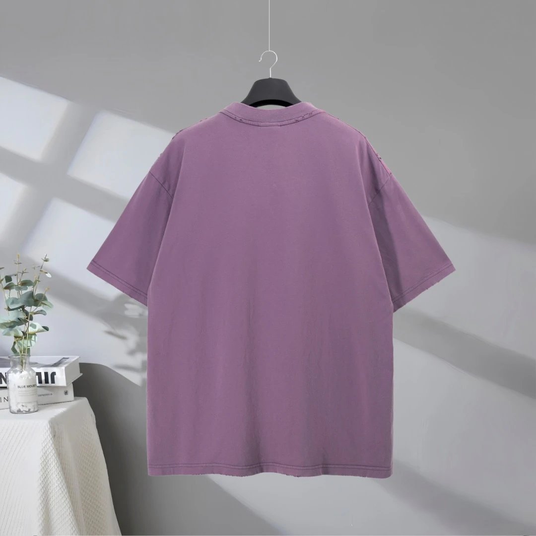 Balenciaga Oversized Purple T-Shirt with Bold Logo Print, Trendy Streetwear Style, Soft Cotton Fabric, Perfect for Fashion Lovers and Casual Everyday Wear.