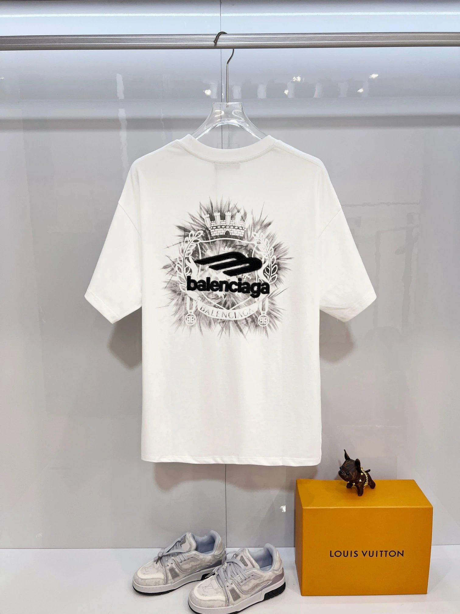 Balenciaga T-Shirt – Premium white cotton tee with signature logo print, minimalist design, and relaxed fit for modern street style and everyday comfort.