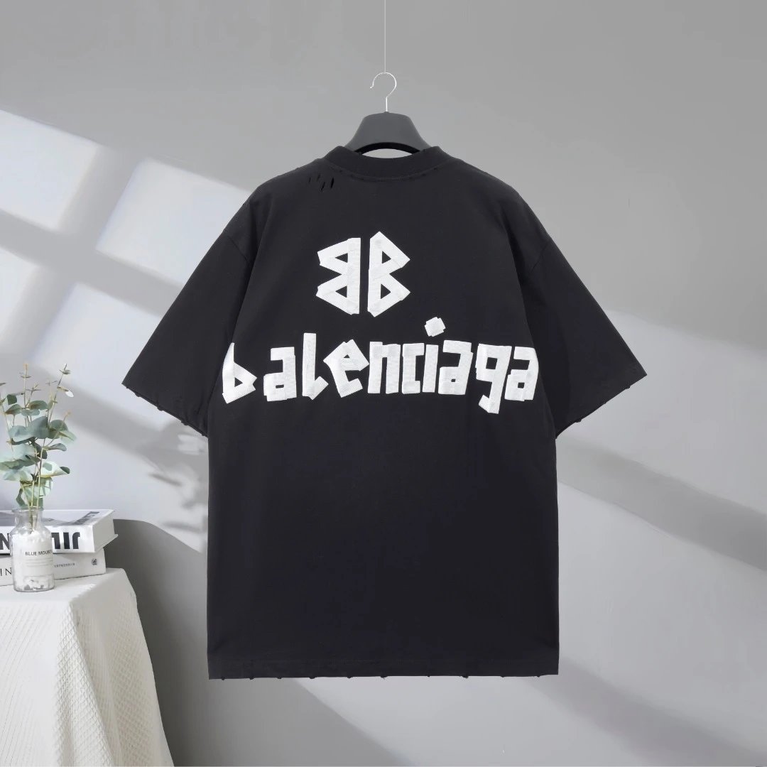 Balenciaga Men’s Black Logo T-Shirt, oversized streetwear style, soft cotton short sleeve top, casual designer fashion tee for everyday comfort and luxury style.