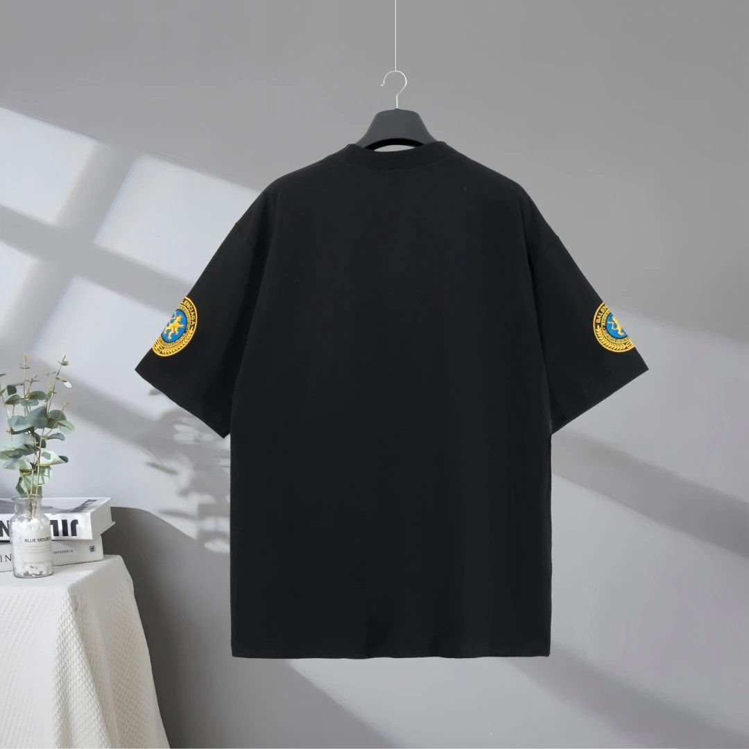 Balenciaga Men’s Black Cotton T-Shirt, minimalist style with chest logo and sleeve patch, streetwear fashion top for casual wear.