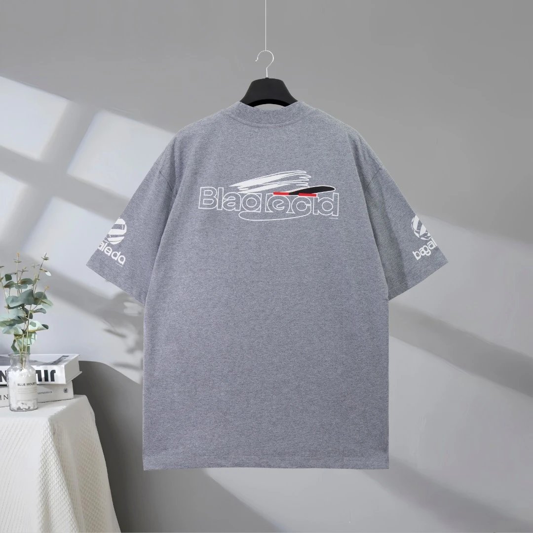 Balenciaga T-Shirt, stylish gray cotton tee with bold front and sleeve logo design, perfect for casual streetwear fashion and daily comfort.