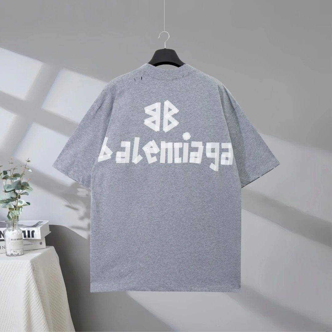 Balenciaga Oversized Gray T-Shirt, premium cotton fabric, bold logo print design, casual streetwear style for men and women, perfect for daily wear and fashion lovers.