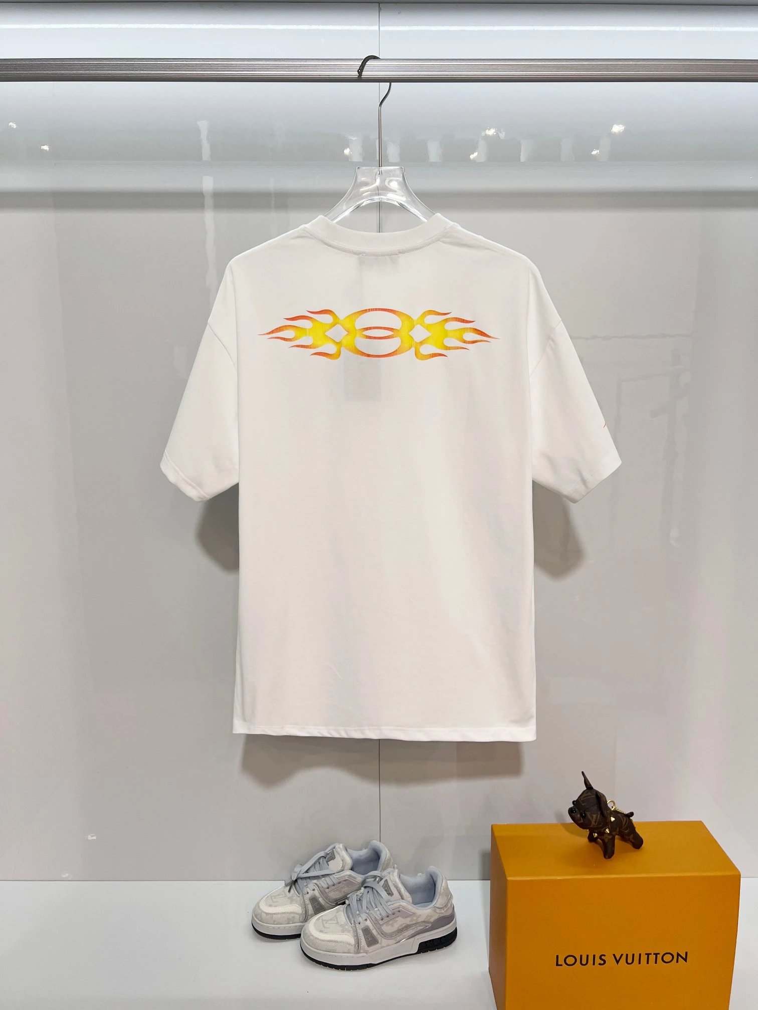 Balenciaga Unisex White Flame Print T-Shirt, premium cotton crewneck tee with modern streetwear style, designer fashion top for casual or urban outfits.