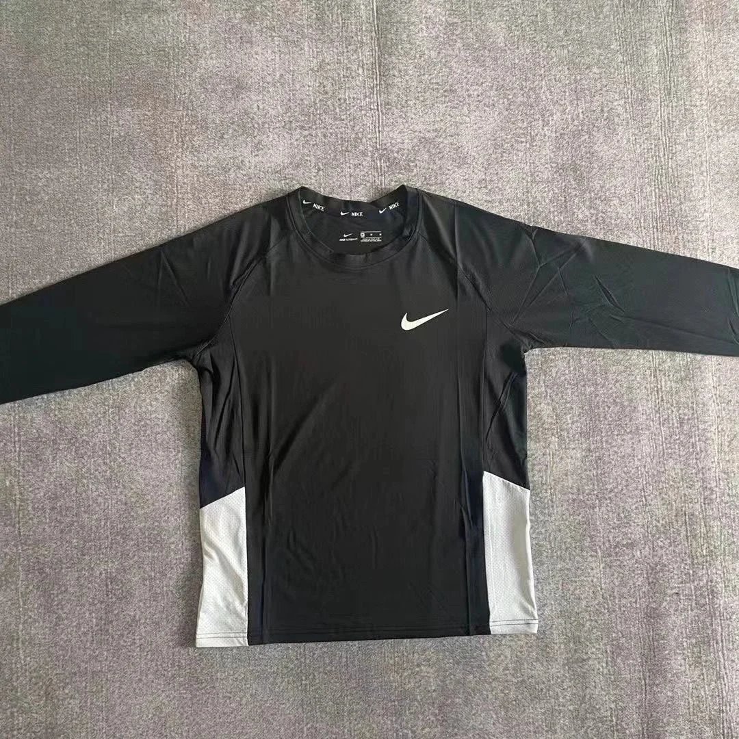 Nike Matching Sets Hooded zip-up windbreaker and tapered pants set — n grams long-sleeved 7