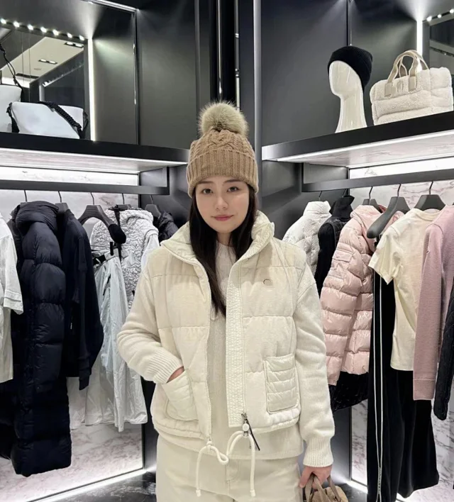 Mengjia FW24 Arques Logo Down Vest Detail