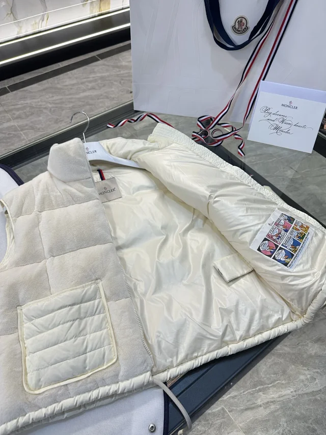 Mengjia FW24 Arques Logo Down Vest Detail