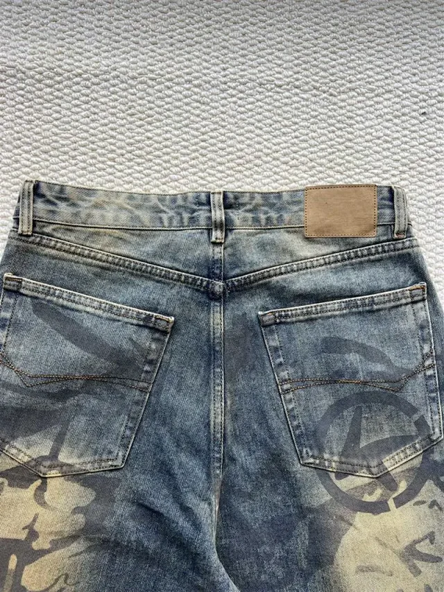 Poison SS25 Balenciaga Distressed Graffiti Jeans Detail