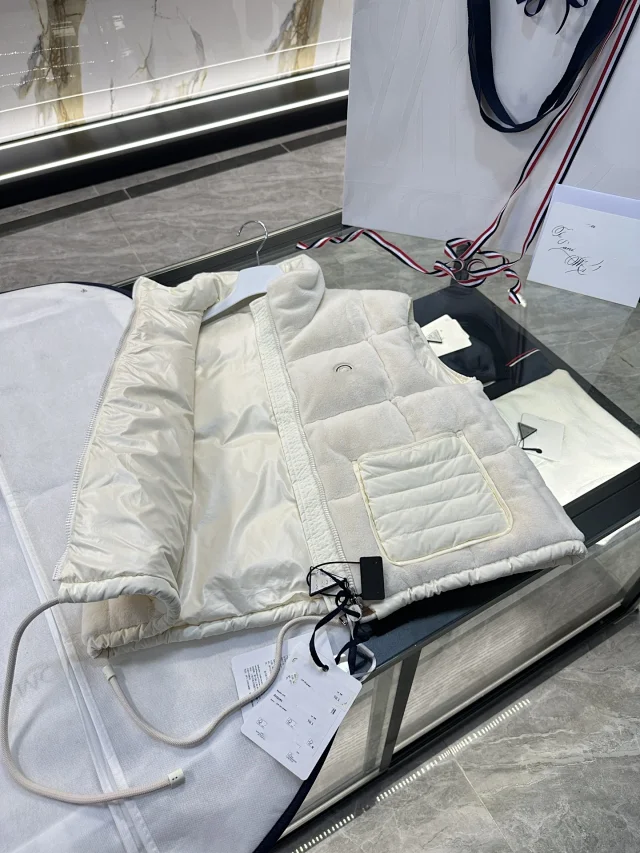 Mengjia FW24 Arques Logo Down Vest Detail