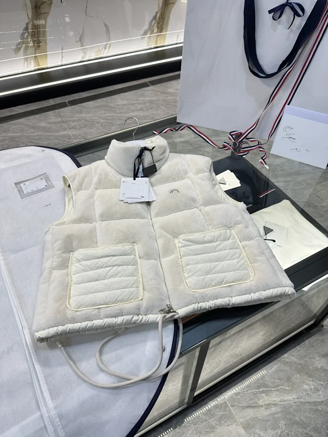 Mengjia FW24 Arques Logo Down Vest Detail