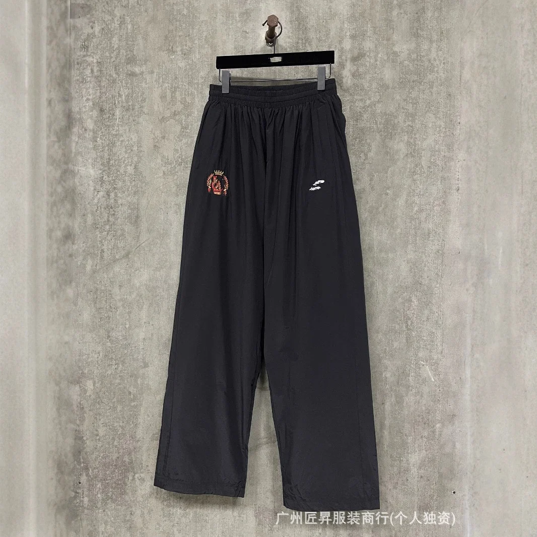 B New Man Utd Nylon Pants OS