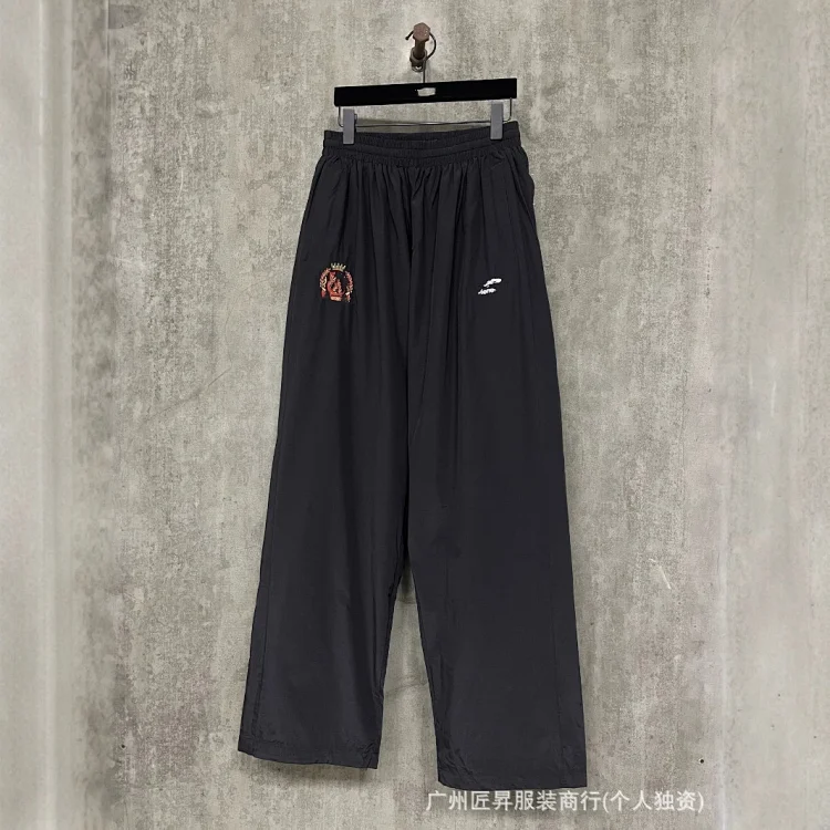B New Man Utd Nylon Pants OS