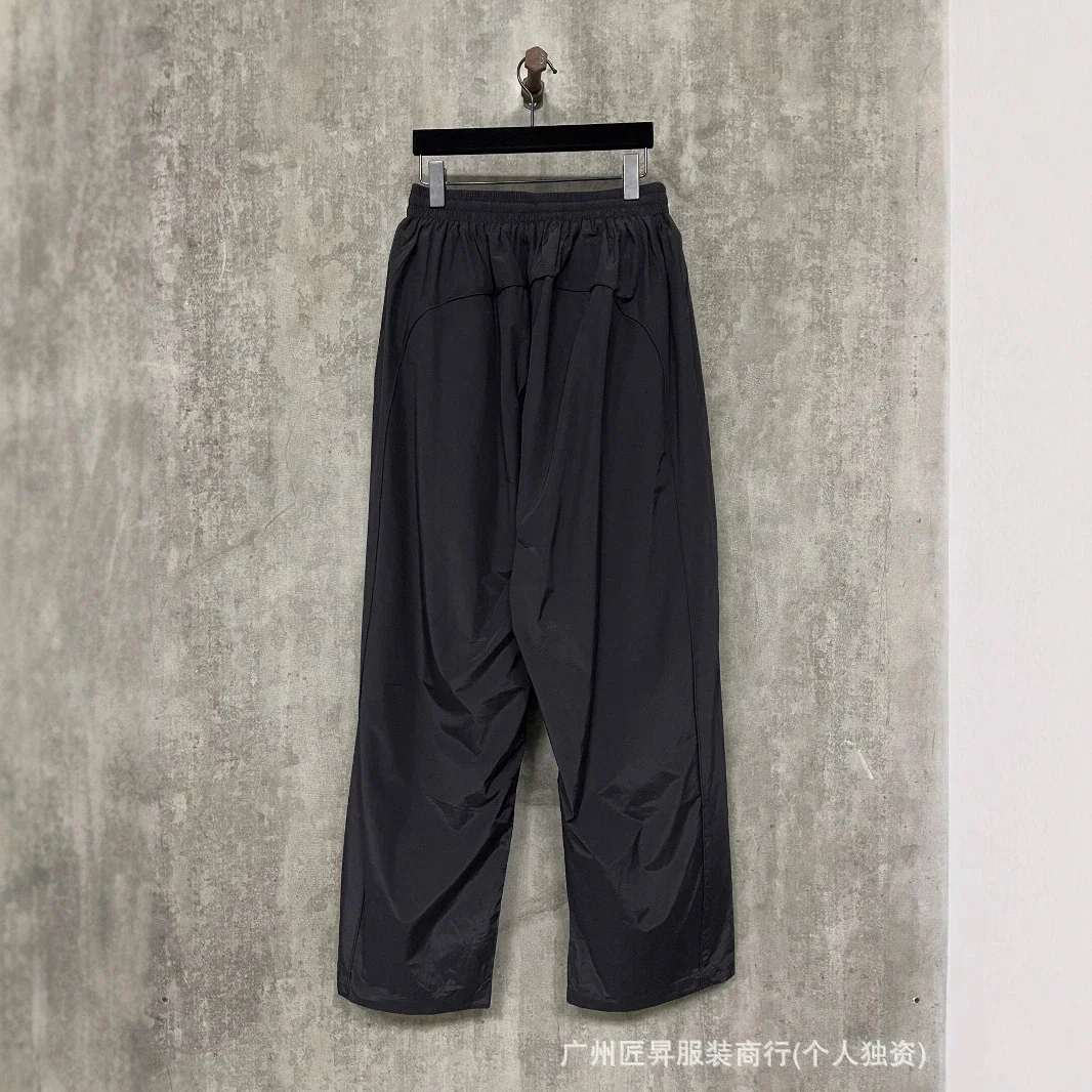 B New Man Utd Nylon Pants OS