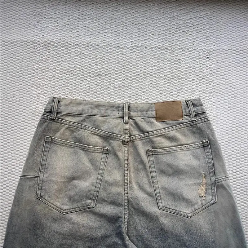 Balenciaga SS25 Distressed Knee - Ripped Jeans