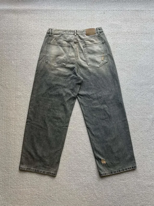 Balenciaga SS25 Distressed Knee - Ripped Jeans Detail