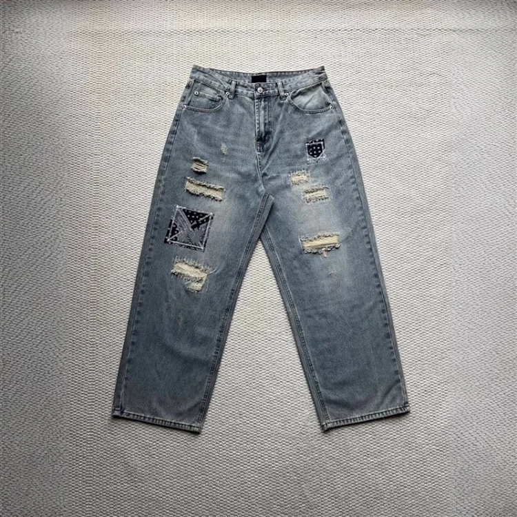 SS25 Balenciaga Heavily Ripped Denim Jeans