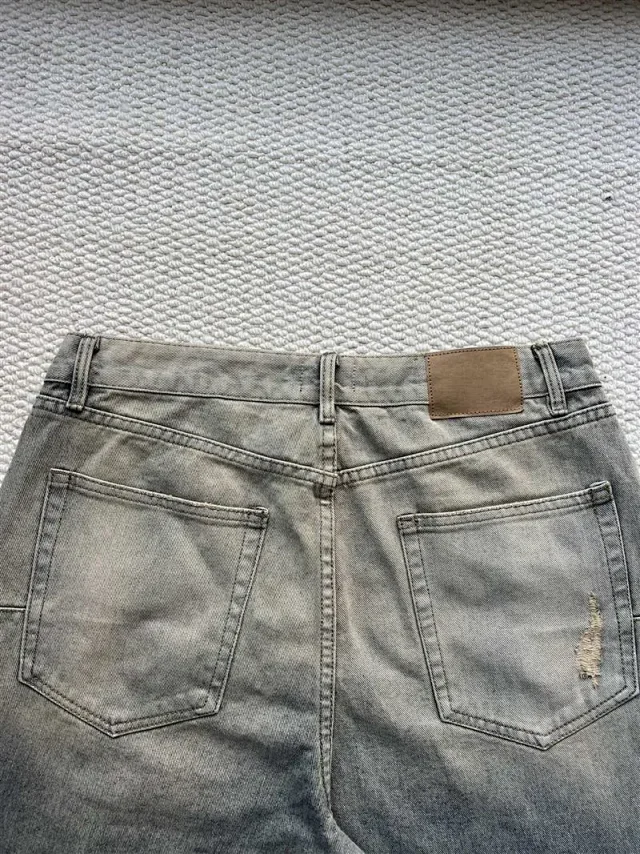 Balenciaga SS25 Distressed Knee - Ripped Jeans Detail