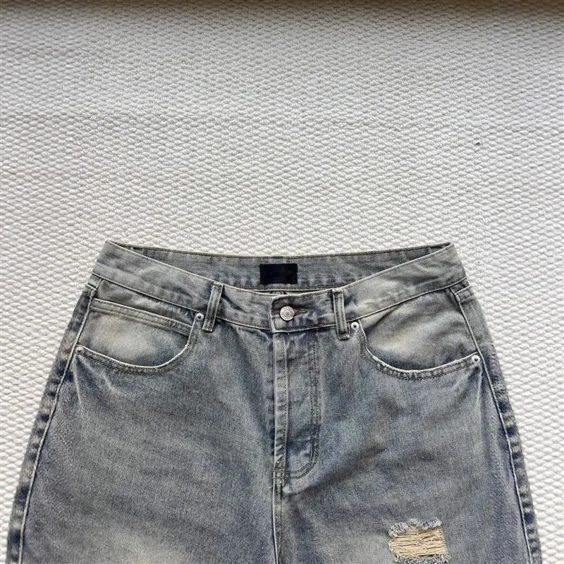 Balenciaga SS25 Distressed Knee - Ripped Jeans