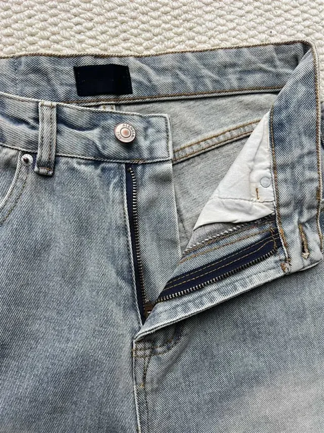 Balenciaga SS25 Washed Distressed Denim Jeans Detail