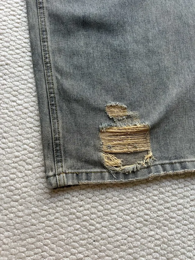Balenciaga SS25 Distressed Knee - Ripped Jeans Detail