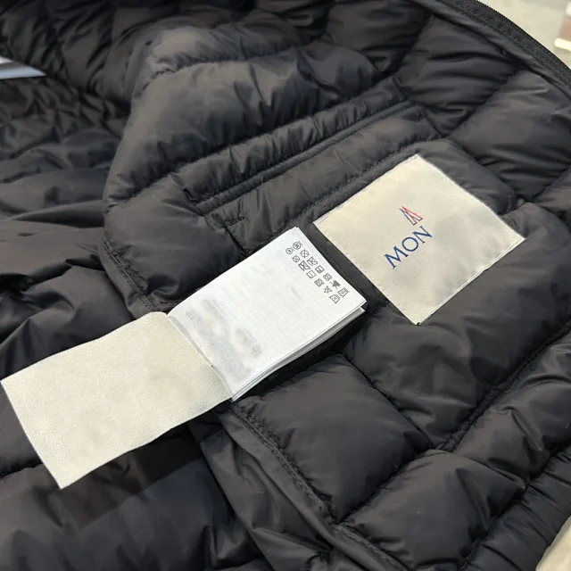 Meng Jia Lans Women's Short Puffer Detail