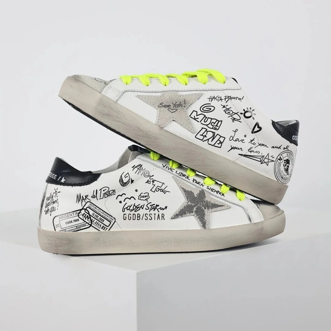 Golden Goose Sneakers Distressed star-appliqué low-top — graffiti black tail