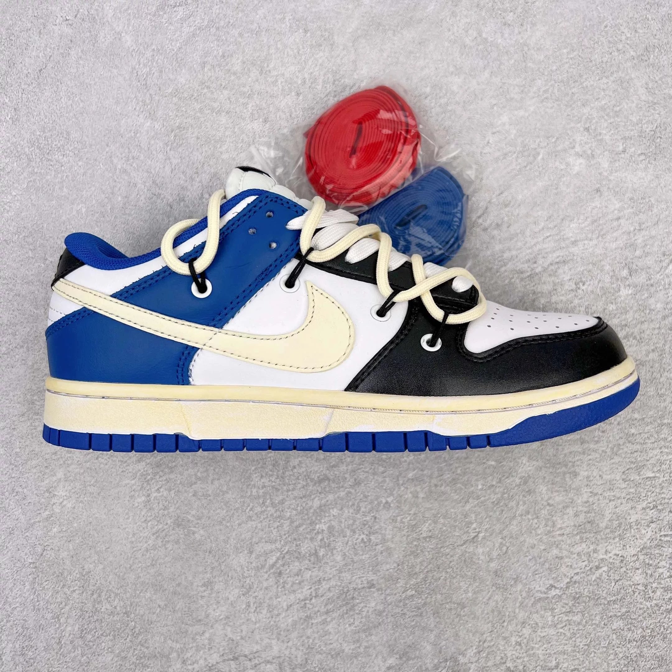Nike Sneakers Dunk Low Retro Deconstructed Lace Design — Black, white, and blue