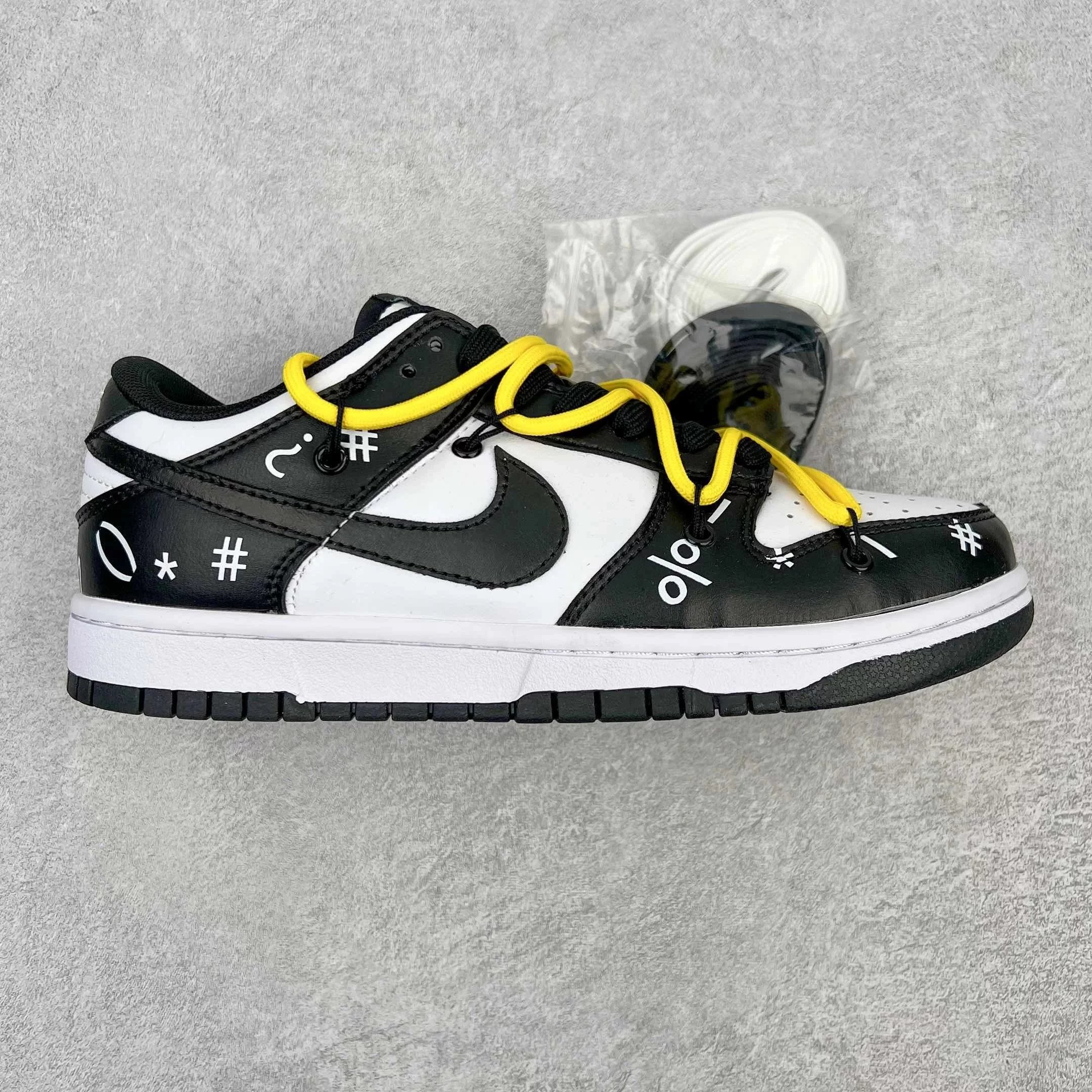 Nike Sneakers Dunk Low Retro Deconstructed Lace Design — black and white yellow rope