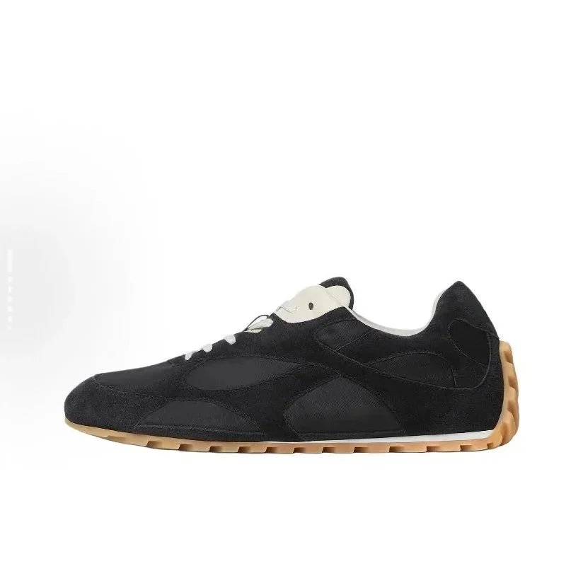 Bottega Veneta Sneakers Lace-up low-top with paneled uppers and gum lug soles — Bv De Xun Black