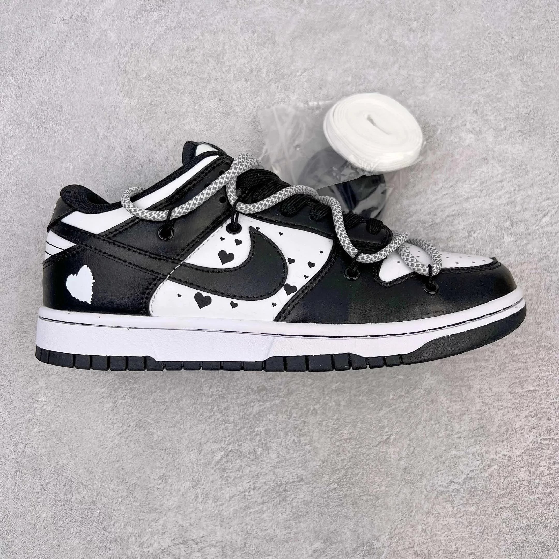 Nike Sneakers Dunk Low Retro Deconstructed Lace Design — Black and white