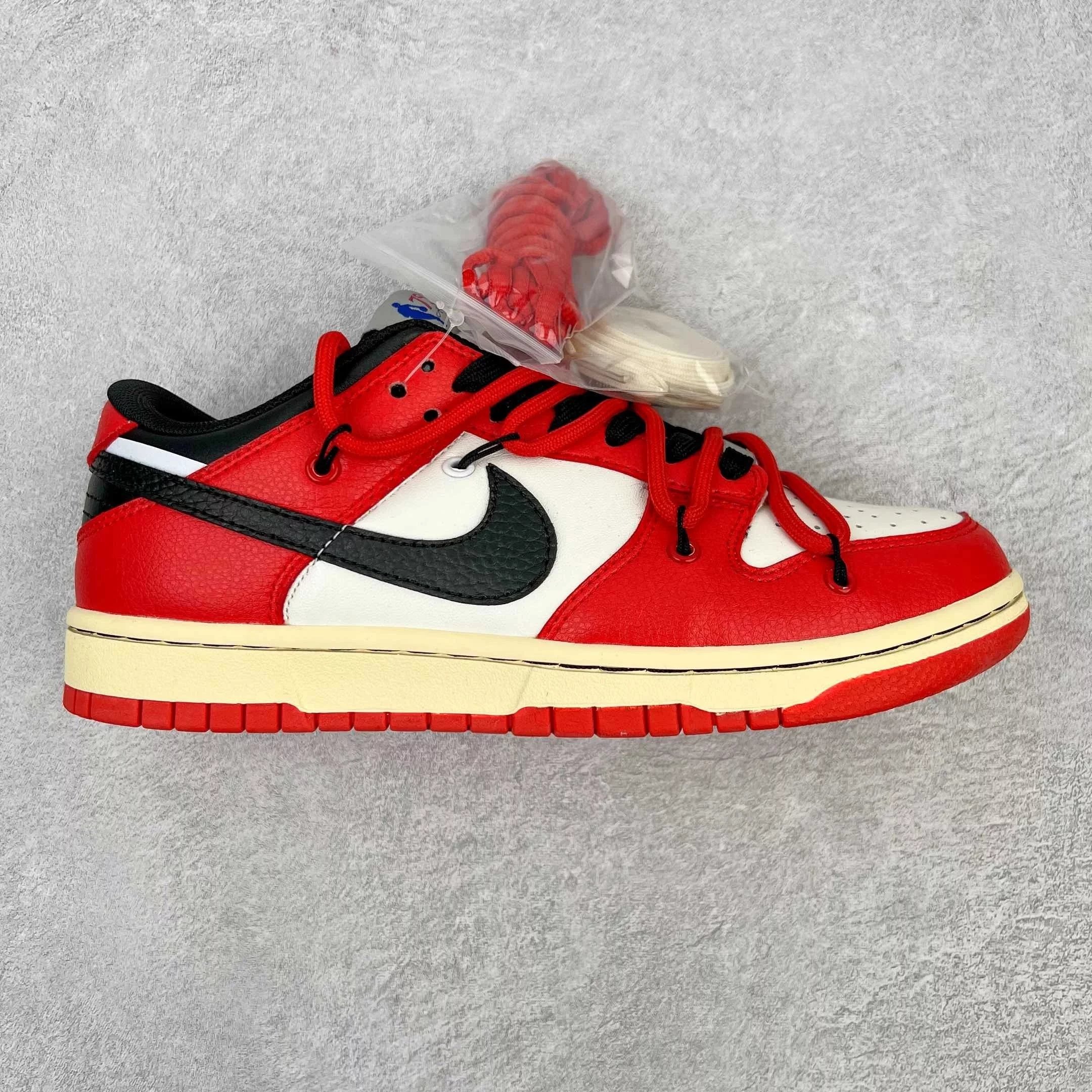 Nike Sneakers Dunk Low Retro Deconstructed Lace Design — Black, white, and red