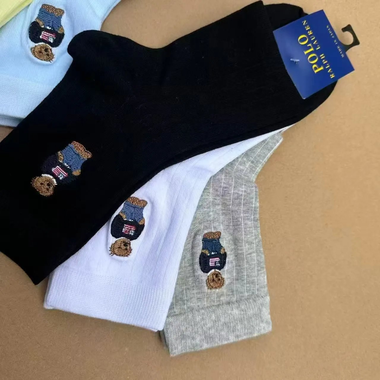 Ralph Lauren Polo Bear Embroidered Crew Socks in Black, White, Gray, and Light Blue - 1