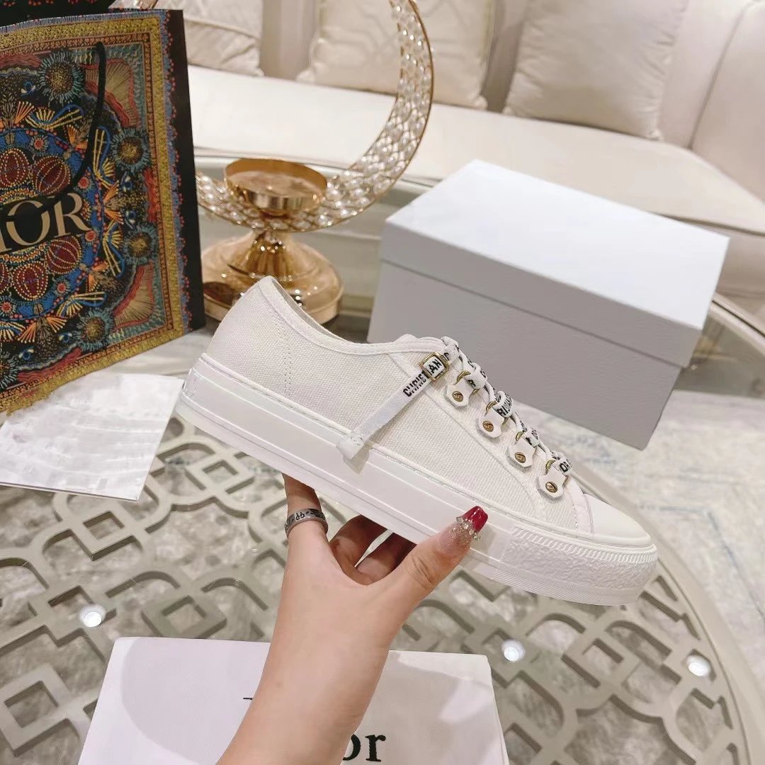 White monogrammed lace-up