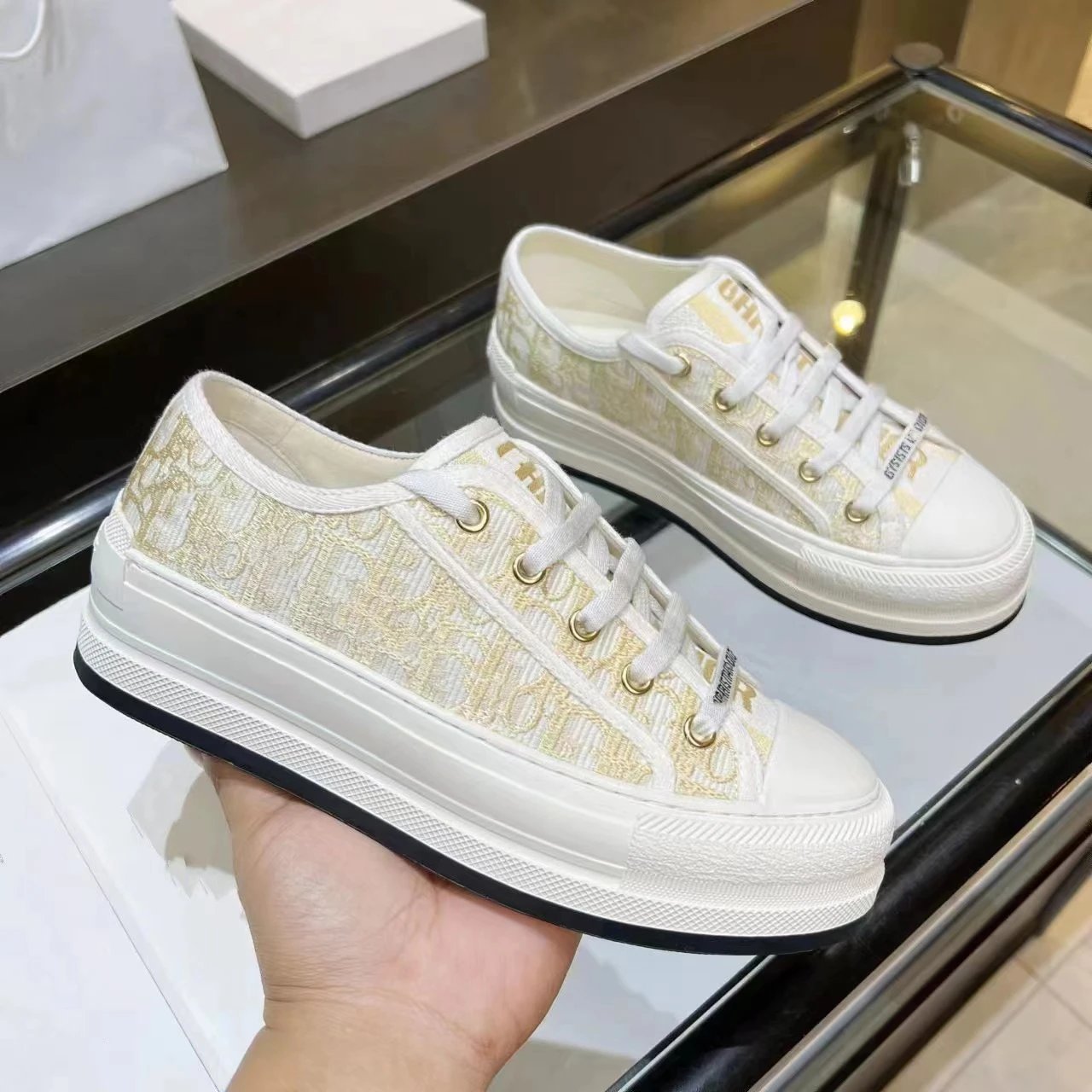 Thick-sole gold-colored letters