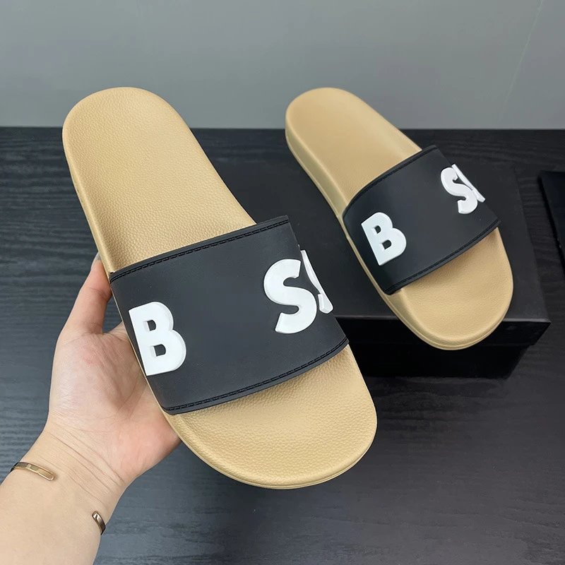 B.OSS Black Slide Sandals with Large White Letter Logo