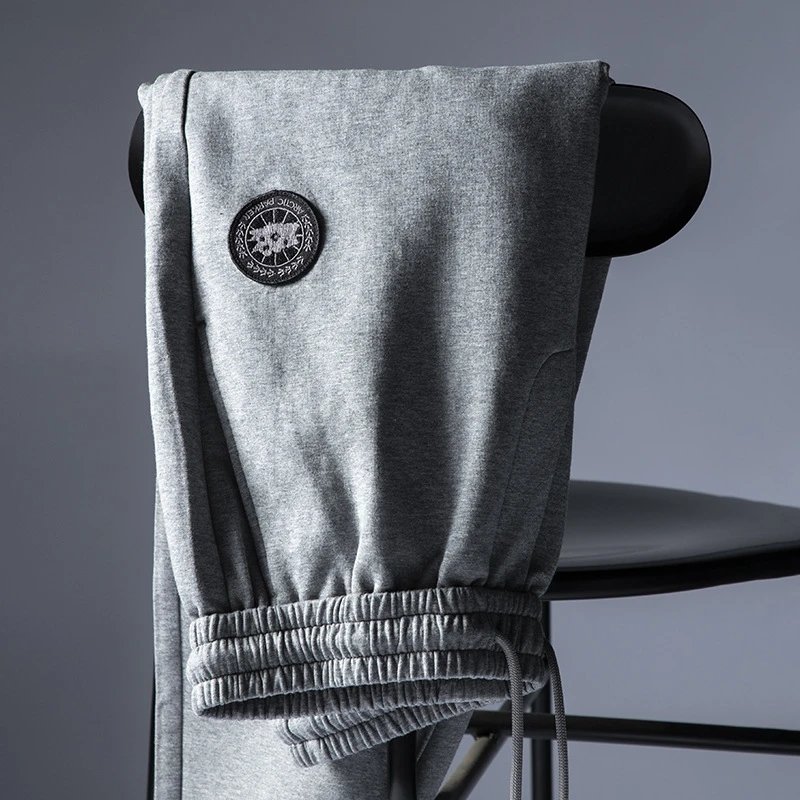 Men's Fleece Lined Jogger Sweatpants with Circular Logo Patch