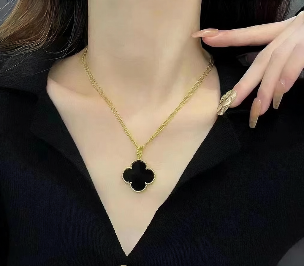 Gold Tone Four Leaf Clover Pendant Necklace with Beaded Edge