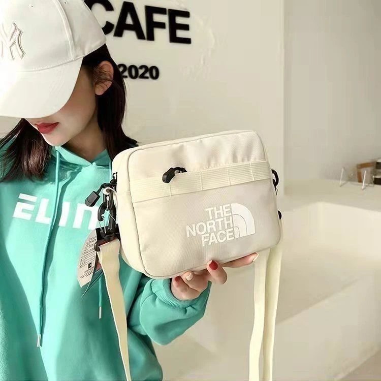 The North Face Compact Crossbody Shoulder Bag with Webbing Detail
