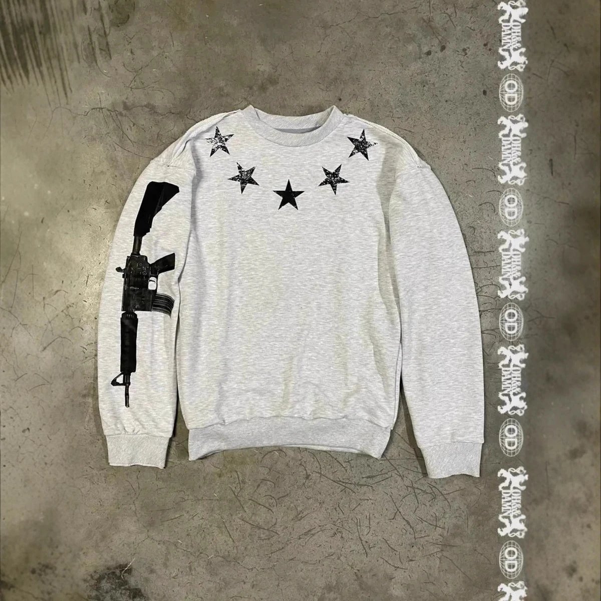 OhDamn Graphic Crewneck Sweatshirt with Rifle and Star Print