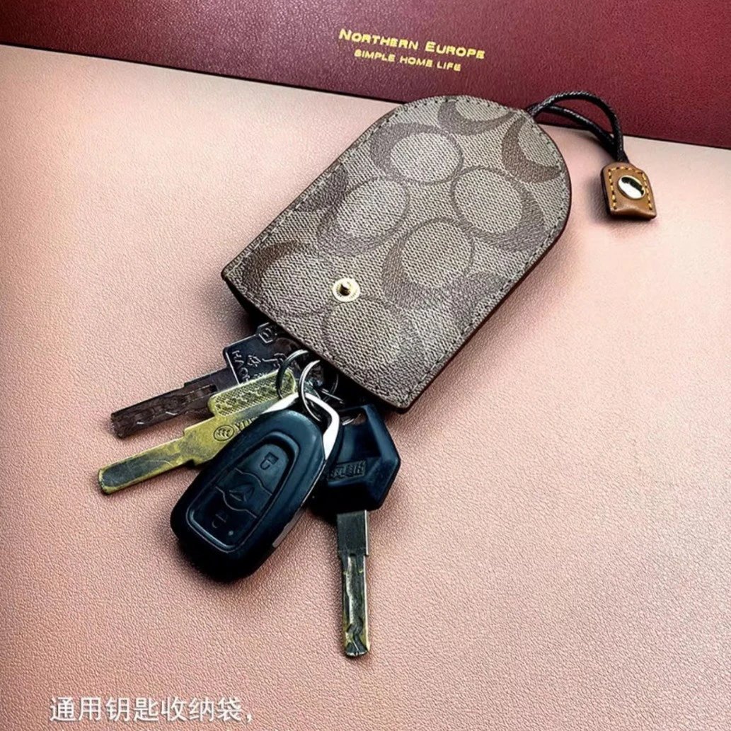 Louis Vuitton Monogram World Tour Black Leather Key Ring Fob