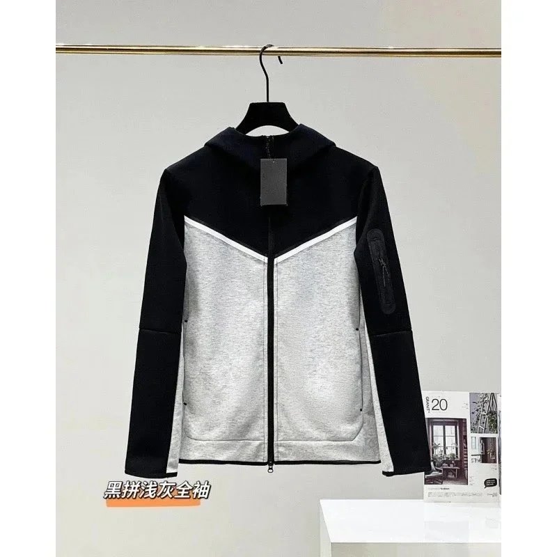 Black spell light gray coat