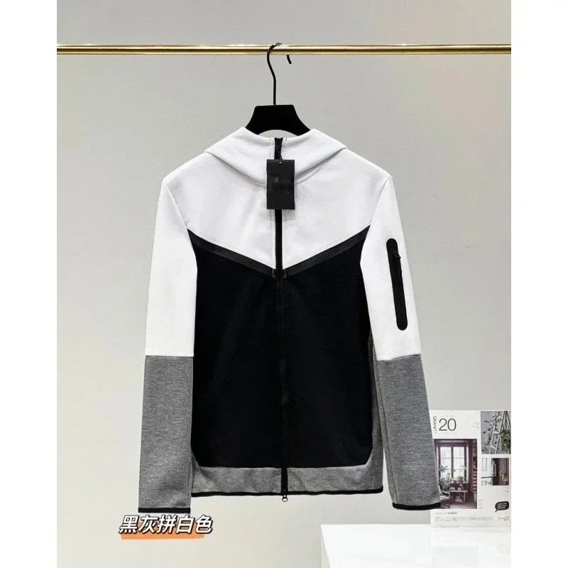Black, white, and gray coat