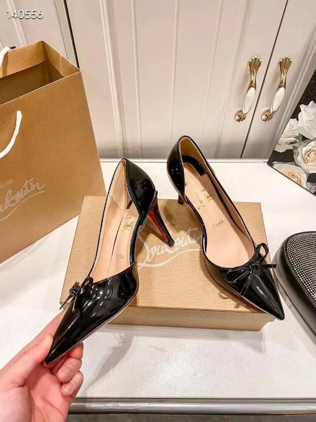 Christian Louboutin Christian Louboutin Black Patent Leather Heels with Bow Detail Black