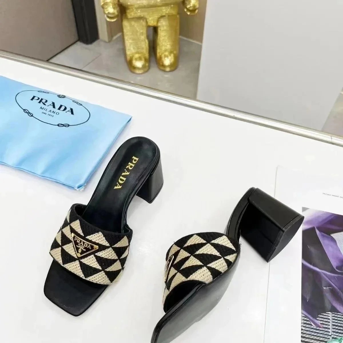 Prada Sandals Woven lug-sole slingback — p36