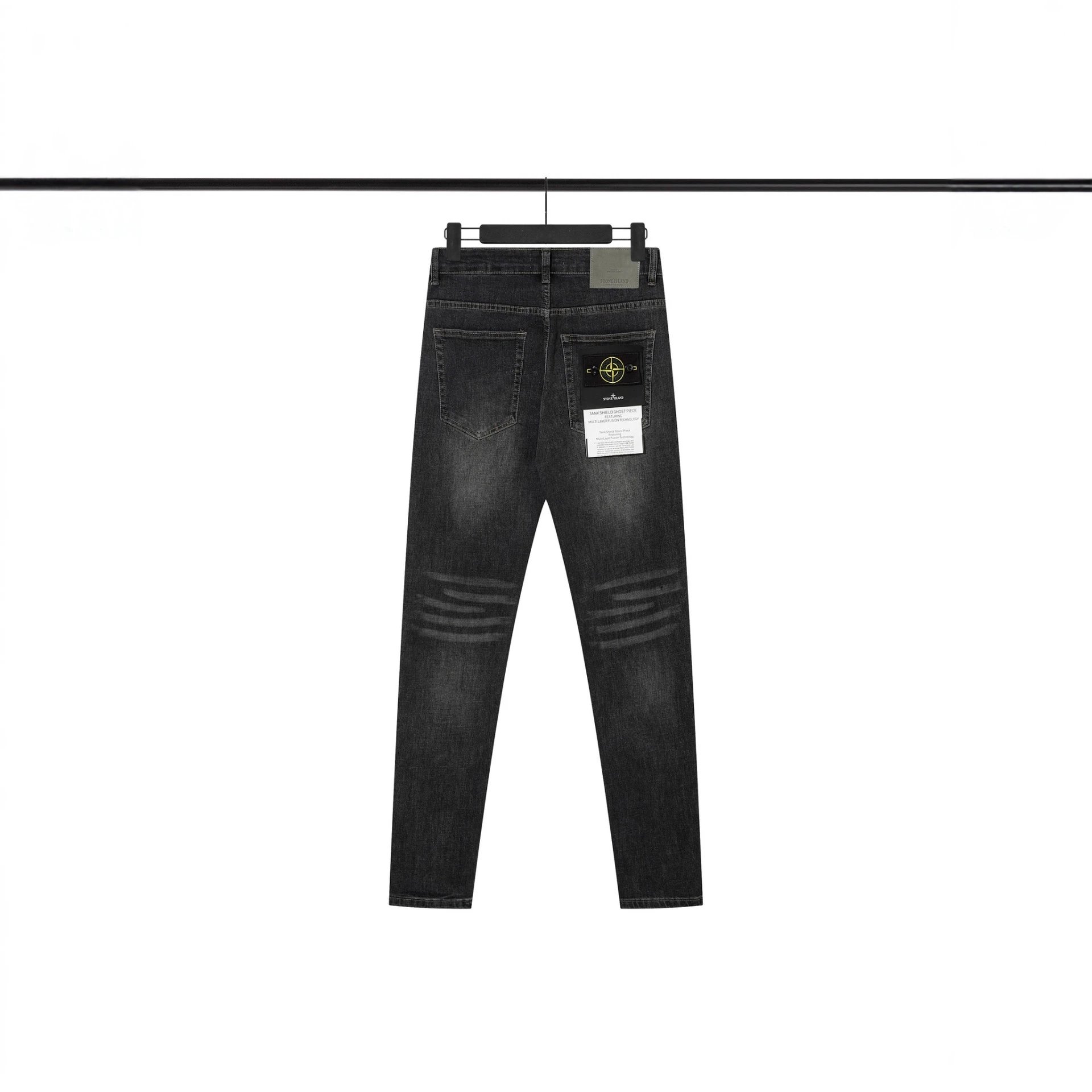 Jeans with embroidered badges on the pockets after washing, slim fit with small feet, casual pants