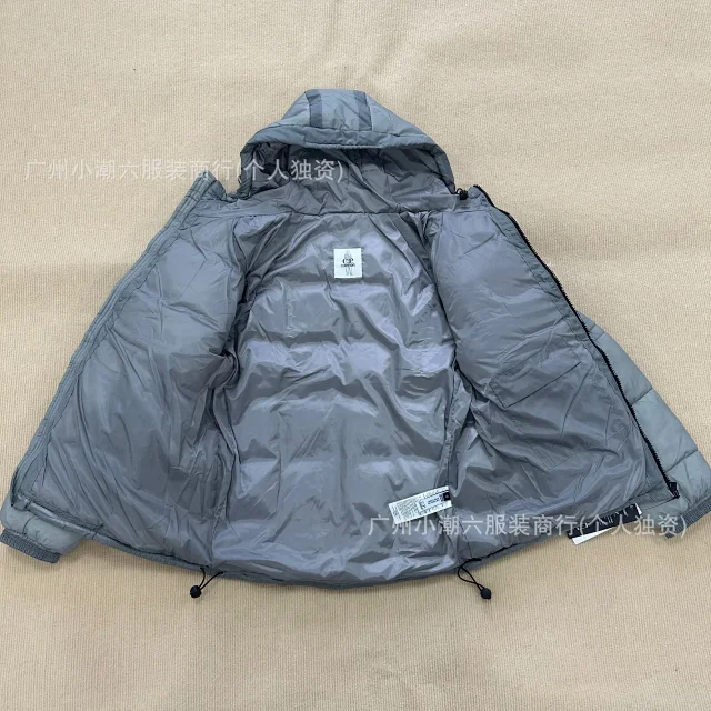 C.P. Company Jackets Hooded quilted padded jacket with sleeve lens detail product detail image 11