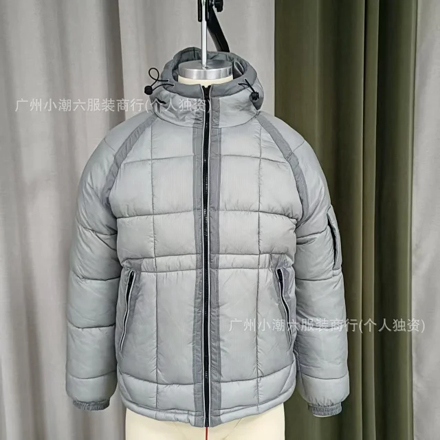 C.P. Company Jackets Hooded quilted padded jacket with sleeve lens detail product detail image 2