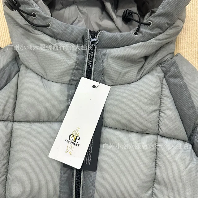 C.P. Company Jackets Hooded quilted padded jacket with sleeve lens detail product detail image 4
