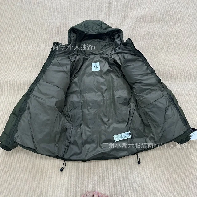 C.P. Company Jackets Hooded quilted padded jacket with sleeve lens detail product detail image 16