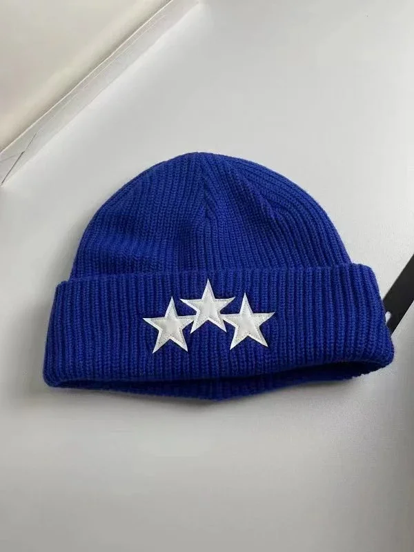 AMIRI Hats Ribbed cuffed knit beanie with embroidered three-star design product detail image 10