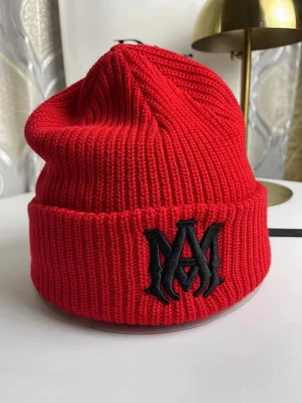 AMIRI Hats Ribbed cuffed knit beanie with embroidered three-star design product detail image 15